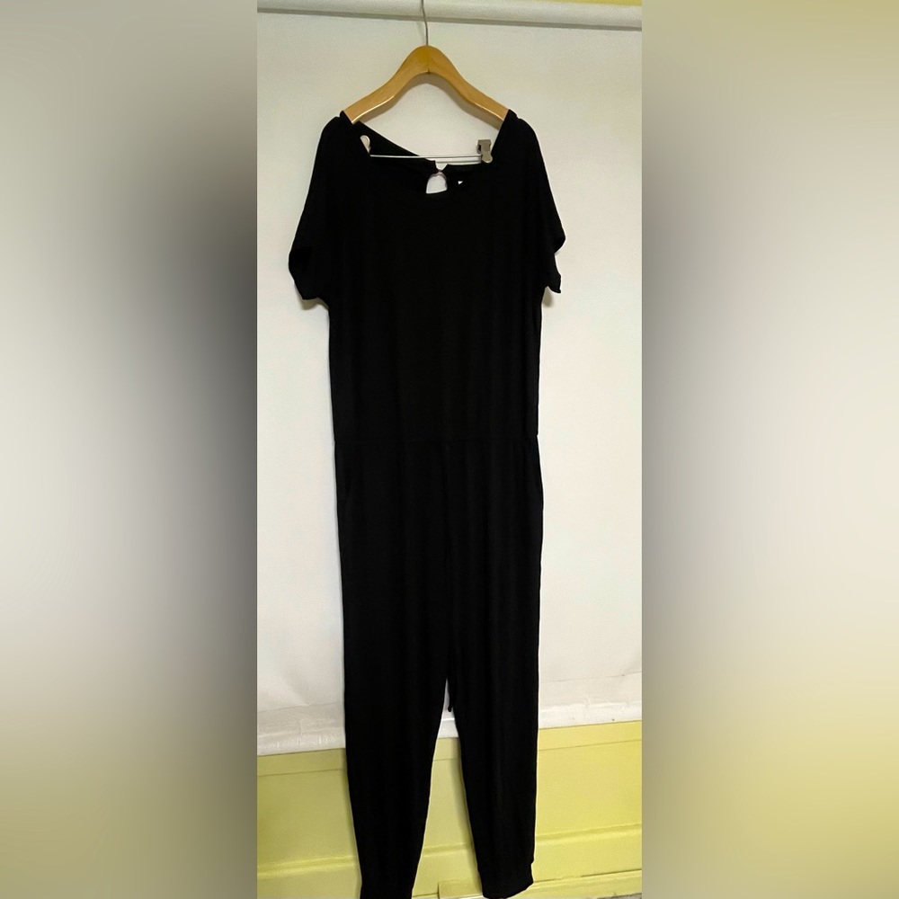 Brand new with tags. Woman’s black long pants romper. Size 2XL